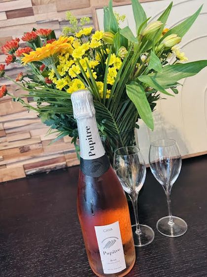 Cava and flowers on the table